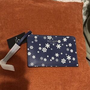 Kate Spade Navy Wristlet with Snowflake Pattern